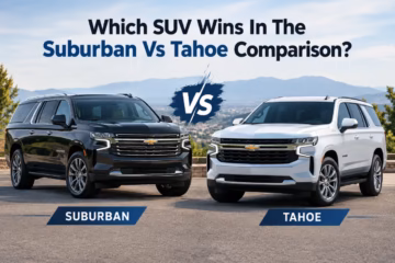 Chevrolet Suburban and Tahoe SUVs parked side by side in a scenic setting for a detailed comparison.